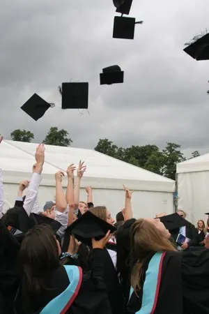 Wonkhe graduates mortarboard throw
