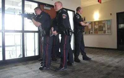 Campus police. Armed and dangerous